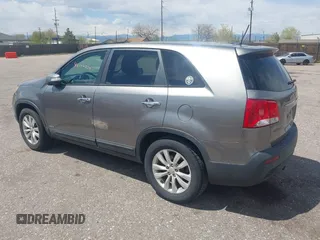 2011 Kia Sorento EX with VIN 5XYKUDA29BG010219, listed as a IAAI auction lot 42106579 with 233,350 mi miles. Bid and sale history available at carsss.com. Image 3.