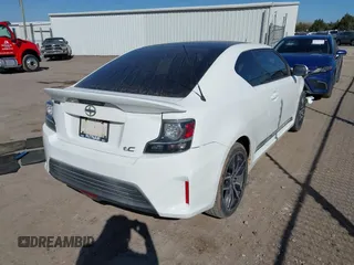 2014 Scion tC z VIN JTKJF5C74E3072410, wystawiony jako IAAI lot #41810965 z przebiegiem 147 164 mil mil oraz . Historia ofert i sprzedaży dostępna na DreamBid. Obrazek 4.