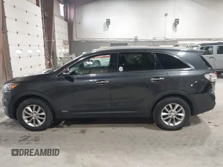 2016 Kia Sorento LX with VIN 5XYPGDA39GG170291, listed as a IAAI auction lot 42045883 with 136,848 mi miles. Bid and sale history available at carsss.com. Image 14.