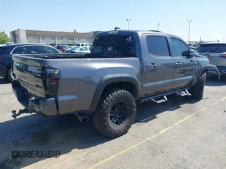 2021 Toyota Tacoma SR z VIN 5TFCZ5AN1MX274315, wystawiony jako IAAI lot #42273054 z przebiegiem 67 863 mil mil oraz . Historia ofert i sprzedaży dostępna na DreamBid. Obrazek 4.