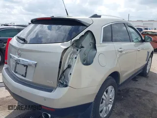 2014 Cadillac SRX Luxury Collection z VIN 3GYFNBE31ES628346, wystawiony jako IAAI lot #41709425 z przebiegiem 47 634 mil mil oraz . Historia ofert i sprzedaży dostępna na DreamBid. Obrazek 6.