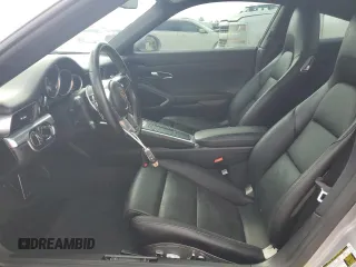 2018 Porsche 911 Carrera z VIN WP0AA2A93JS105437, wystawiony jako Copart lot #78437934 z przebiegiem Nie podano mil oraz Szkoda całkowita • Salvage title. Historia ofert i sprzedaży dostępna na DreamBid. Obrazek 7.
