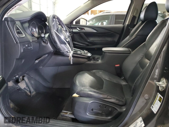 2017 Mazda CX-9 Touring with VIN JM3TCBCY5H0134295, listed as a Copart auction lot 63448185 with 174,248 mi miles and Salvage title. Bid and sale history available at DreamBid. Image 7.