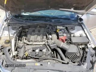 2012 Ford Fusion SE z VIN 3FAHP0HG8CR145183, wystawiony jako Copart lot #58627705 z przebiegiem 236 148 mil mil oraz Szkoda całkowita • Salvage title. Historia ofert i sprzedaży dostępna na DreamBid. Obrazek 11.