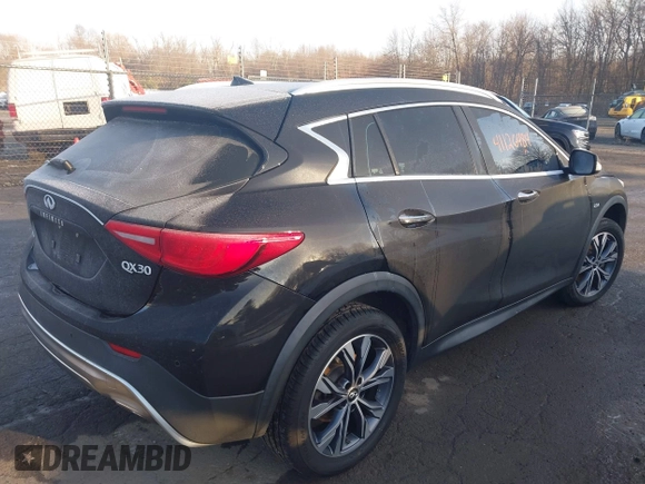 2018 Infiniti QX30 Luxury with VIN SJKCH5CR4JA046890, listed as a IAAI auction lot 41126484 with 92,165 mi miles and . Bid and sale history available at DreamBid. Image 4.