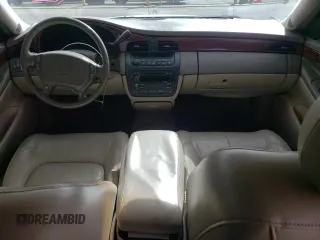 2004 Cadillac DeVille z VIN 1G6KD54Y54U181978, wystawiony jako Copart lot #47458905 z przebiegiem 145 708 mil mil oraz Szkody całkowita. Historia ofert i sprzedaży dostępna na DreamBid. Obrazek 8.