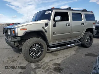 2005 Hummer H2 SUV z VIN 5GRGN23U65H106597, wystawiony jako Copart lot #54508345 z przebiegiem Nie podano mil oraz Szkoda całkowita • Salvage title. Historia ofert i sprzedaży dostępna na DreamBid. Obrazek 1.
