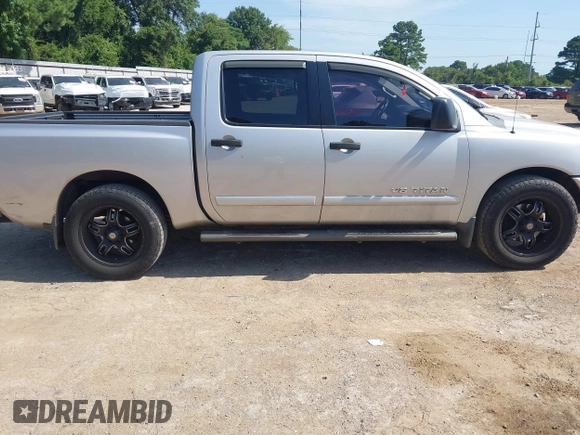 2012 Nissan Titan SV with VIN 1N6BA0ED8CN320723, listed as a IAAI auction lot 42642482 with 214,941 mi miles and . Bid and sale history available at DreamBid. Image 13.