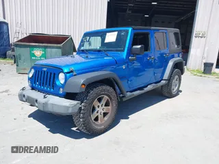 2015 Jeep Wrangler Unlimited Sport with VIN 1C4BJWDG2FL509773, listed as a IAAI auction lot 42753729 with 156,330 mi miles and . Bid and sale history available at DreamBid. Image 2.