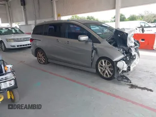 2012 Mazda 5 Touring with VIN JM1CW2CLXC0100950, listed as a IAAI auction lot 42648466 with 276,752 mi miles and . Bid and sale history available at DreamBid. Image 1.