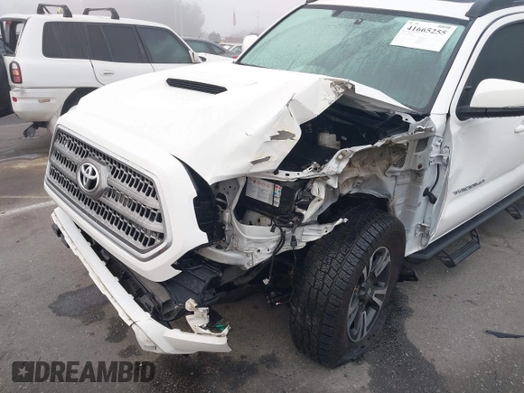 2016 Toyota Tacoma SR with VIN 3TMCZ5AN0GM030469, listed as a IAAI auction lot 41665255 with 178,591 mi miles and . Bid and sale history available at carsss.com. Image 6.
