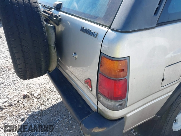 1995 Isuzu Rodeo z VIN 4S2CM58V4S4363500, wystawiony jako IAAI lot #41821801 z przebiegiem 94 480 mil mil oraz . Historia ofert i sprzedaży dostępna na DreamBid. Obrazek 12.