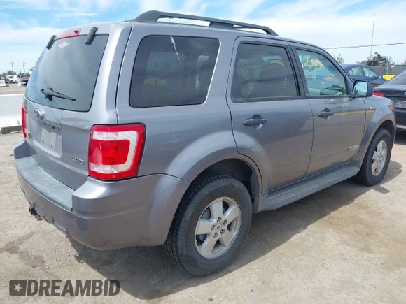 2008 Ford Escape XLT with VIN 1FMCU93128KA42482, listed as a IAAI auction lot 41979106 with 292,130 mi miles. Bid and sale history available at carsss.com. Image 4.
