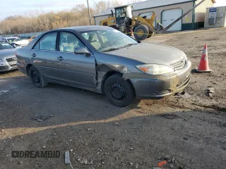 2004 Toyota Camry LE with VIN 4T1BE32K54U811927, listed as a Copart auction lot 80942704 with 197,990 mi miles and Clean title. Bid and sale history available at DreamBid. Image 4.