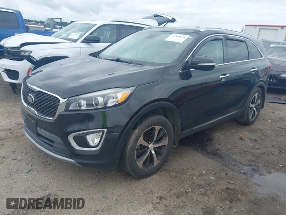 2018 Kia Sorento EX with VIN 5XYPH4A52JG354719, listed as a IAAI auction lot 42385011 with 151,567 mi miles and . Bid and sale history available at DreamBid. Image 2.