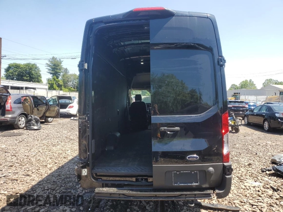 2024 Ford Transit Cargo z VIN 1FTBW3X81RKB79008, wystawiony jako Copart lot #58158005 z przebiegiem Nie podano mil oraz Szkoda całkowita • Salvage title. Historia ofert i sprzedaży dostępna na DreamBid. Obrazek 6.