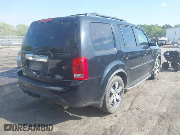 2012 Honda Pilot Touring with VIN 5FNYF4H95CB026191, listed as a IAAI auction lot 42021987 with 229,273 mi miles and . Bid and sale history available at DreamBid. Image 4.