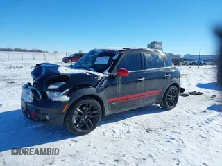 2011 MINI Countryman S with VIN WMWZC5C50BWL55234, listed as a IAAI auction lot 41323339 with 134,709 mi miles and . Bid and sale history available at DreamBid. Image 18.