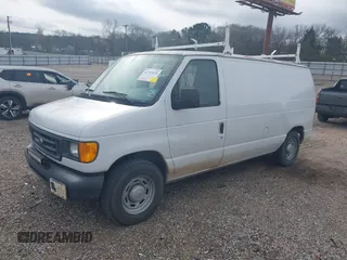 2004 Ford Econoline Cargo with VIN 1FTRE14WX4HA06537, listed as a IAAI auction lot 41745018 with 246,963 mi miles. Bid and sale history available at carsss.com. Image 2.
