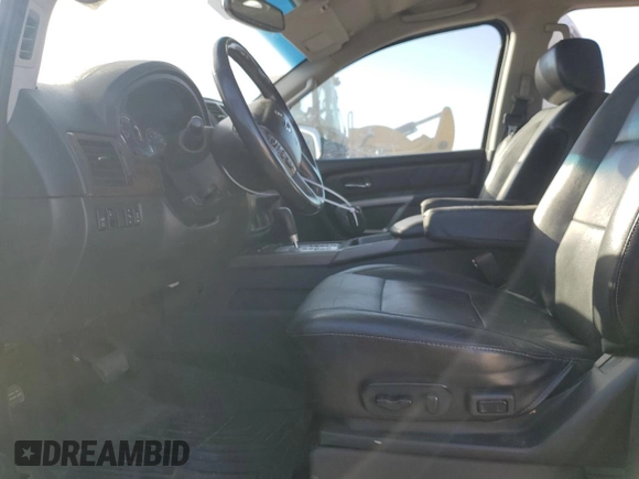 2015 Nissan Armada Platinum z VIN 5N1AA0NCXFN616784, wystawiony jako Copart lot #73331944 z przebiegiem 187 771 mil mil oraz Szkoda całkowita • Salvage title. Historia ofert i sprzedaży dostępna na DreamBid. Obrazek 7.