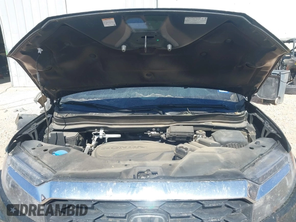 2023 Honda Passport EX-L z VIN 5FNYF8H5XPB013172, wystawiony jako IAAI lot #41680601 z przebiegiem 29 016 mil mil oraz . Historia ofert i sprzedaży dostępna na DreamBid. Obrazek 10.