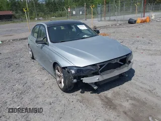 2013 BMW 3 Series 328i with VIN WBA3A5C57DF356069, listed as a IAAI auction lot 42078635 with 140,669 mi miles. Bid and sale history available at carsss.com. Image 1.