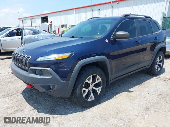2015 Jeep Cherokee Trailhawk with VIN 1C4PJMBS3FW704622, listed as a IAAI auction lot 42465702 with 96,831 mi miles and . Bid and sale history available at DreamBid. Image 17.