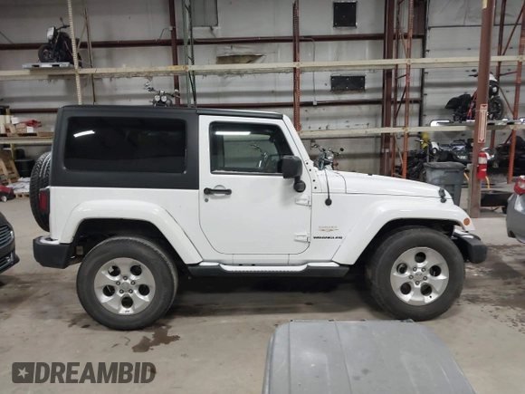 2014 Jeep Wrangler Sahara with VIN 1C4AJWBG7EL234625, listed as a IAAI auction lot 41726770 with 128,080 mi miles and . Bid and sale history available at DreamBid. Image 13.