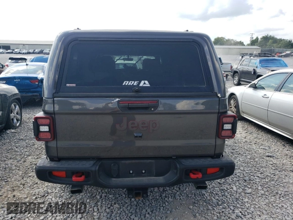 2021 Jeep Gladiator Rubicon with VIN 1C6JJTBG3ML602478, listed as a Copart auction lot 58138705 with 76,759 mi miles and Salvage title. Bid and sale history available at DreamBid. Image 6.