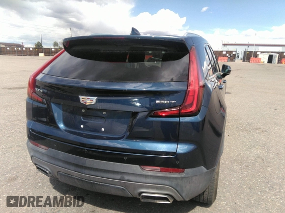 2021 Cadillac XT4 FWD Premium Luxury with VIN 1GYFZCR48MF004009, listed as a IAAI auction lot 41956723 with 82,483 mi miles. Bid and sale history available at carsss.com. Image 16.