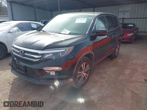 2017 Honda Pilot EX-L with VIN 5FNYF5H5XHB005735, listed as a IAAI auction lot 41791678 with 131,480 mi miles. Bid and sale history available at carsss.com. Image 2.
