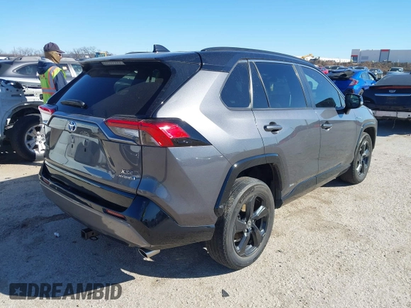 2021 Toyota RAV4 Hybrid XSE with VIN 4T3E6RFV5MU057078, listed as a IAAI auction lot 41718381 with 65,797 mi miles. Bid and sale history available at carsss.com. Image 4.