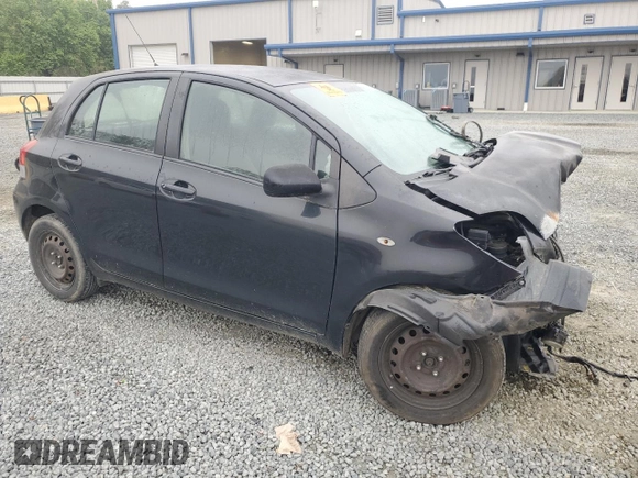 2009 Toyota Yaris with VIN JTDKT903095243922, listed as a Copart auction lot 51293545 with 196,909 mi miles and Salvage Title. Bid and sale history available at carsss.com. Image 4.