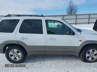 2003 Mazda Tribute ES with VIN 4F2CZ96133KM22960, listed as a IAAI auction lot 41550181 with 159,412 mi miles. Bid and sale history available at carsss.com. Image 14.