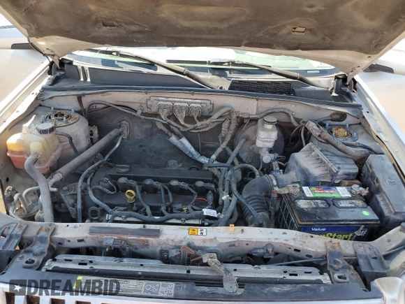 2009 Mercury Mariner Premier with VIN 4M2CU87719KJ04415, listed as a Copart auction lot 74785494 with 305,554 mi miles and Salvage Title. Bid and sale history available at carsss.com. Image 12.