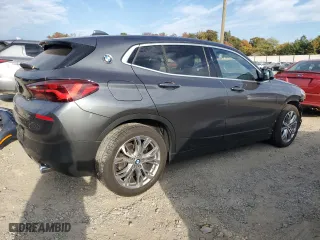 2021 BMW X2 xDrive28i with VIN WBXYJ1C07M5S21169, listed as a Copart auction lot 77829574 with 24,173 mi miles and Salvage Title. Bid and sale history available at carsss.com. Image 3.