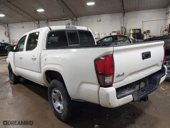 2023 Toyota Tacoma 4WD SR with VIN 3TMCZ5AN7PM571924, listed as a IAAI auction lot 41219097 with 34,292 mi miles. Bid and sale history available at carsss.com. Image 3.