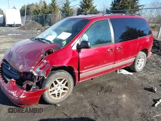 1999 Dodge Caravan z VIN 1B4GP45G7XB554879, wystawiony jako IAAI lot #41644242 z przebiegiem Nie podano mil oraz . Historia ofert i sprzedaży dostępna na DreamBid. Obrazek 2.