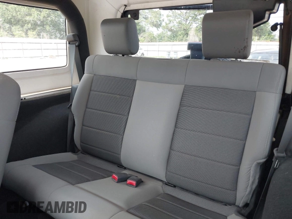 2009 Jeep Wrangler X with VIN 1J4FA24149L781794, listed as a IAAI auction lot 42352426 with 99,128 mi miles and . Bid and sale history available at DreamBid. Image 8.