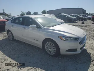2015 Ford Fusion SE Hybrid with VIN 3FA6P0LU7FR177065, listed as a Copart auction lot 53750715 with 174,815 mi miles and Salvage Title. Bid and sale history available at DreamBid. Image 4.