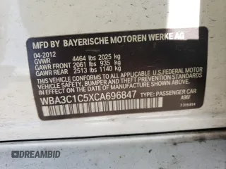 2012 BMW 3 Series 328i with VIN WBA3C1C5XCA696847, listed as a Copart auction lot 53005425 with 143,725 mi miles and Salvage title. Bid and sale history available at DreamBid. Image 14.