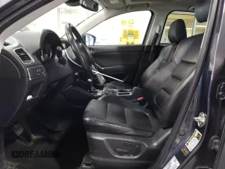2016 Mazda CX-5 Grand Touring with VIN JM3KE4DY8G0616421, listed as a Copart auction lot 50884525 with 182,048 mi miles and Salvage Title. Bid and sale history available at DreamBid. Image 7.