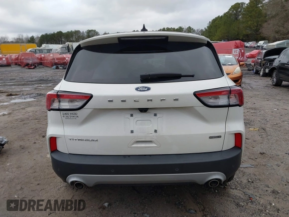 2020 Ford Escape Titanium Hybrid with VIN 1FMCU9DZ0LUC56274, listed as a IAAI auction lot 41256530 with 43,502 mi miles and . Bid and sale history available at DreamBid. Image 17.