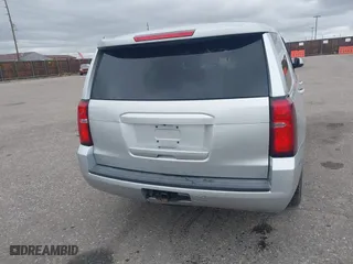 2015 Chevrolet Tahoe Commercial with VIN 1GNSK2ECXFR681555, listed as a IAAI auction lot 41975359 with 126,785 mi miles. Bid and sale history available at carsss.com. Image 16.