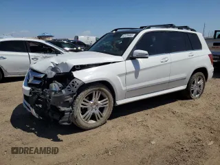 2015 Mercedes-Benz GLK 250 with VIN WDCGG0EB2FG402004, listed as a Copart auction lot 63126493 with 130,821 mi miles and . Bid and sale history available at DreamBid. Image 1.