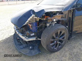 2022 Tesla Model X with VIN 7SAXCAE59NF346186, listed as a IAAI auction lot 41893923 with Not Provided miles and . Bid and sale history available at DreamBid. Image 6.