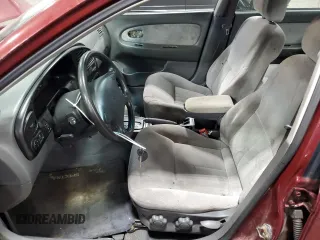 2003 Kia Spectra with VIN KNAFB121735217341, listed as a Copart auction lot 72016504 with 116,224 mi miles and Salvage Title. Bid and sale history available at DreamBid. Image 7.