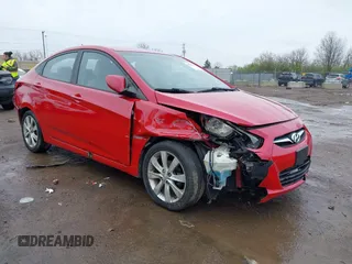 2012 Hyundai Accent GLS with VIN KMHCU4AEXCU168661, listed as a IAAI auction lot 41963258 with 216,006 mi miles. Bid and sale history available at carsss.com. Image 1.