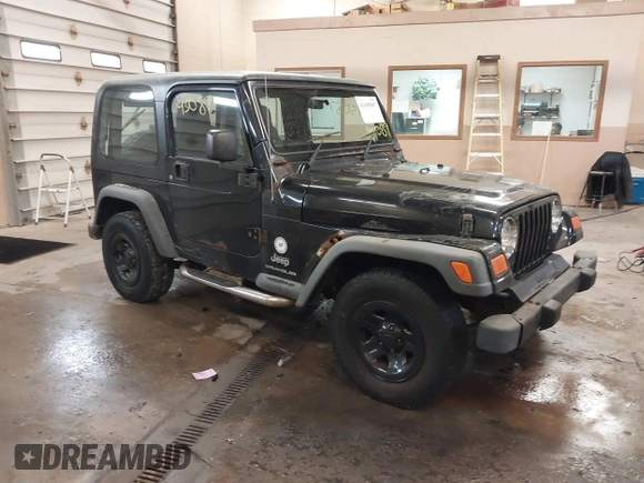 2003 Jeep Wrangler Sport Right Hand Drive with VIN 1J4F449S63P359031, listed as a IAAI auction lot 41495087 with 126,678 mi miles. Bid and sale history available at carsss.com. Image 1.
