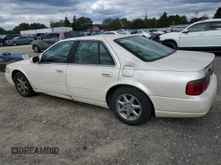 2002 Cadillac Seville Luxury SLS z VIN 1G6KS54Y42U263557, wystawiony jako Copart lot #76303424 z przebiegiem 164 707 mil mil oraz Szkoda całkowita • Salvage title. Historia ofert i sprzedaży dostępna na DreamBid. Obrazek 2.